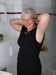 Naughty German housewife taking a shower